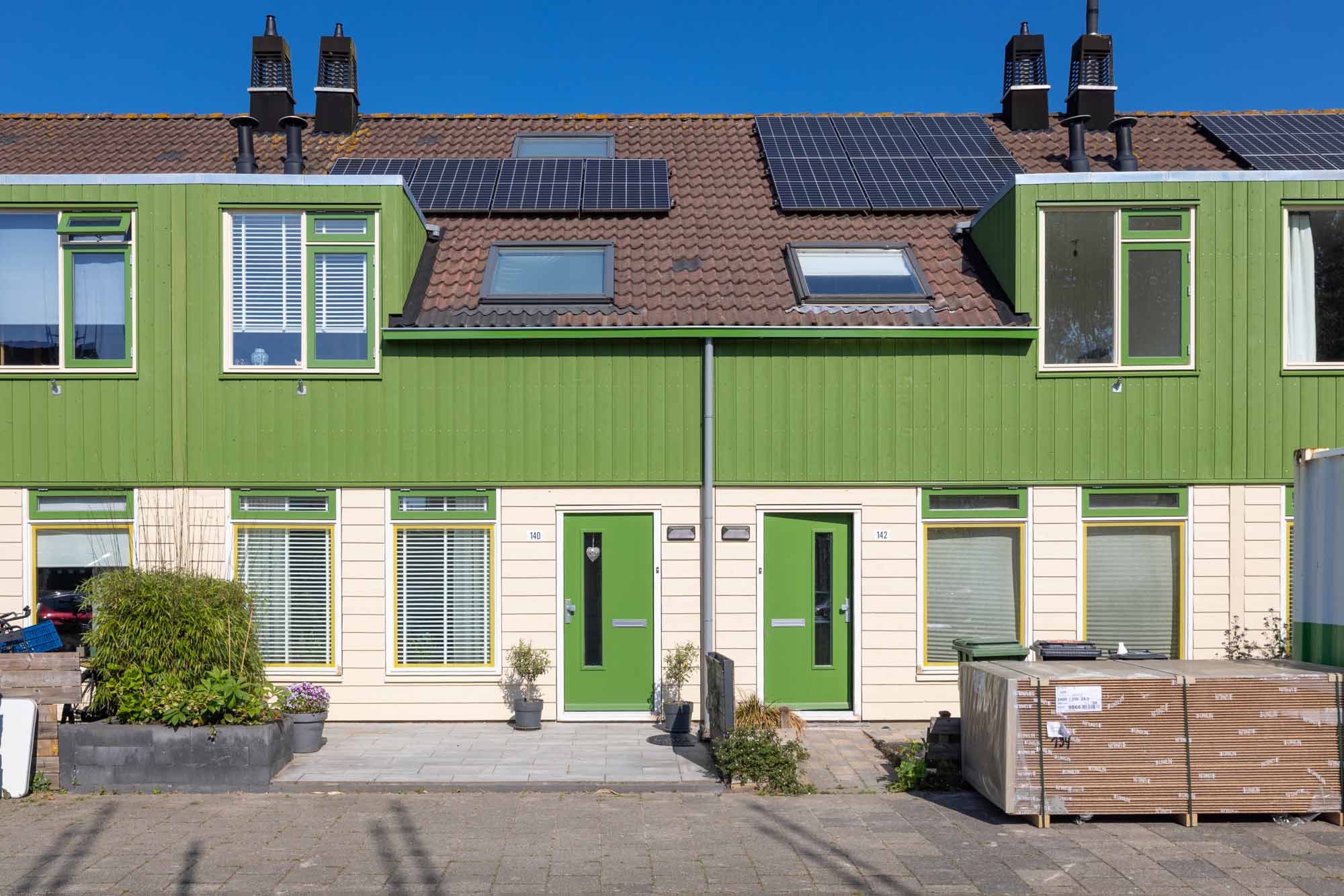 Aanbrengen nieuwe gevelbekleding 72 woningen Dassenbos